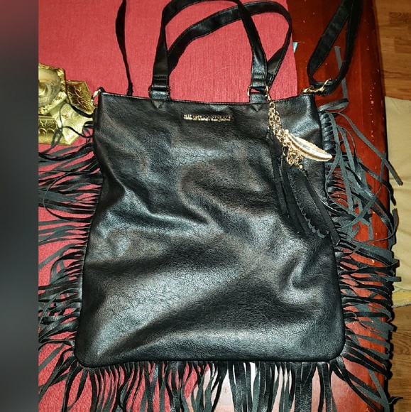 Leather jacket with fringes and purse - Picture 6 of 6